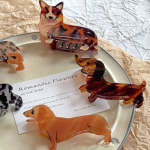 Cute acetate dog hair claws with dachshund and shepherd designs in marble textures