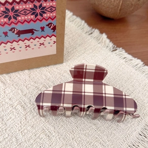 Vintage burgundy plaid hair claw clip for women on elegant white textured fabric backdrop