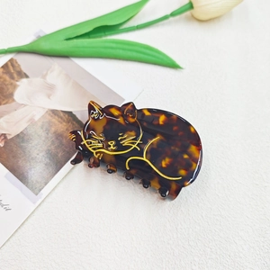 Pince à cheveux élégante en acétate écaille de tortue avec motif chat doré