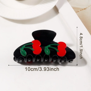 Détail montrant les dimensions de la pince à cheveux cerise noire de 10 cm sur fond blanc