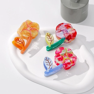 Pinces à cheveux fleurs en acétate aux motifs floraux pastel pour queues de cheval