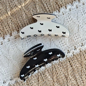Large acetate hair claw clips with black and white Scottie dog patterns for women