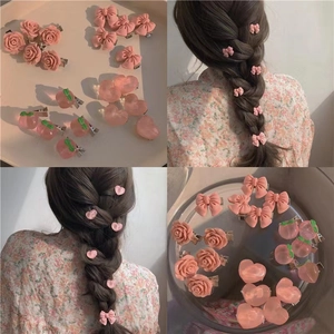 Set de barrettes roses avec rose, nœud, pêche et cœur pour coiffure de jeune fille