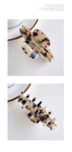 Detail showing the tortoise shell pattern resin hair claw clip with metal spring