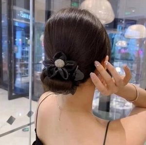 Elegant black organza flower hair claw with sparkling rhinestones for hair styling