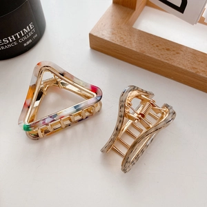 French style acetate hair claws with triangle patterns and gold metal spring clips