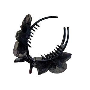 Elegant black organza camellia flower hair claw clip with silver glitter center for women
