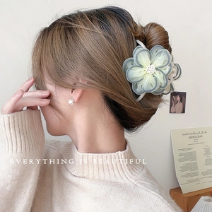 Elegant camellia hair claw clip with gradient mesh petals and pearl detail for women