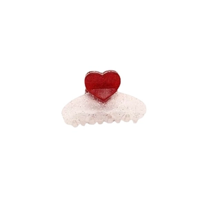Pince à cheveux cœur étincelante avec cœur à paillettes rouges et base translucide