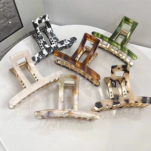 Set of 6 large acetate leopard print claw clips for hair in various marble patterns