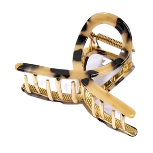 Tortoiseshell acetate hair claw clip with golden metal base and double ring design