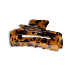 Macro detail of rectangle leopard print acetate hair claw clip with cutout design