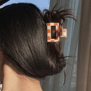 Orange and cream checkered hair claw clip for women stylish hair styling accessory