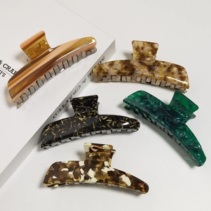 5-piece set of elegant acetate hair claws in tortoise shell and marble patterns