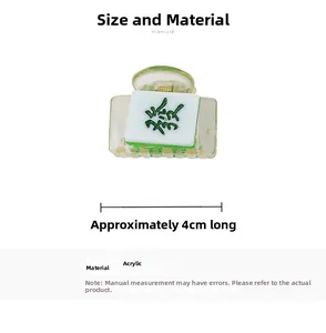 Macro detail of a 4cm green Mahjong hair clip made of durable acrylic material