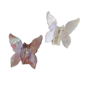 French vintage butterfly hair claw clips in pearlescent pink and white acetate material