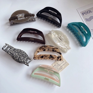 Hollow out acetate hair claw clips in various tortoiseshell and solid colors for women