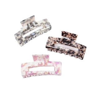 Set of three large acetate claw clips in marble, tortoiseshell, and pink cloud patterns