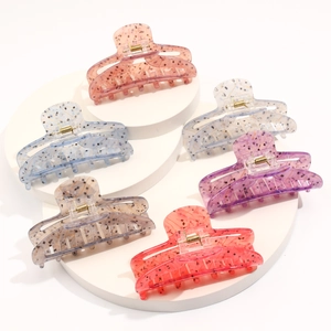 Set of six large acetic acid hair claws with floral patterns in diverse vibrant colors