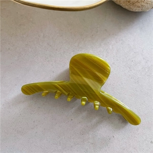 Minimalist green acetate hair claw clip with marble texture for elegant hair styling