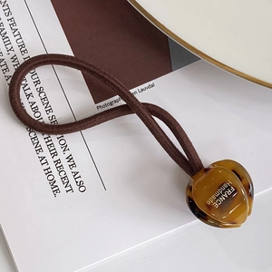 Élastique à cheveux fait main en résine ambrée avec inscription France artisanale