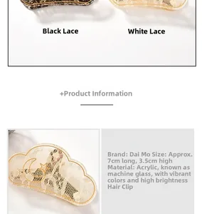 Macro detail of acrylic hair claw clip with gold moon and star patterns and lace texture