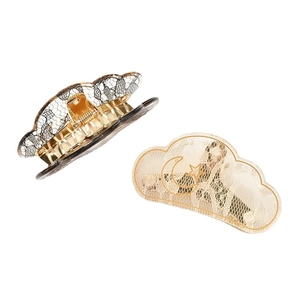 Lace cloud claw clips in black mesh and white moon-star pattern with gold metal springs