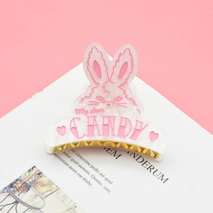 Pink marble acetate bunny hair claw clip with golden metal teeth and cute candy text