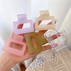 Set of five large square candy-colored hair claw clips in matte and clear resin