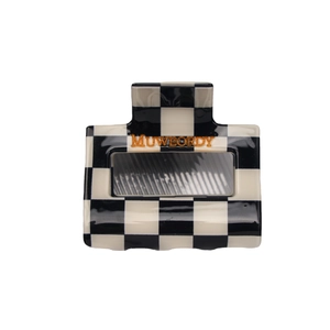 Classic checkered hair claw clip in acetate with gold MUWEORDY embossed lettering