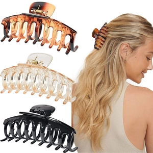 Set of three large hair claw clips in black, amber, and champagne for thick hair styling