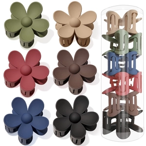 Set of 6 matte flower hair clips in various colors with a clear storage tube cylinder