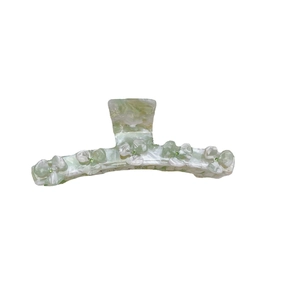 Floral acetate hair claw clip with green marble texture and sparkling crystals