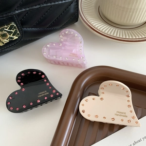 Set di tre mollette per capelli a cuore in acetato con strass scintillanti rosa e neri