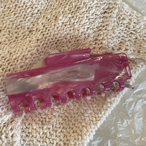 Close-up of pink marble acetate hair claw clip with France Handmade engraving