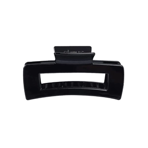 Detail view of the glossy black hollow rectangular hair claw clip with a strong spring