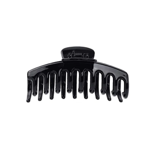 Classic glossy black large hair claw clip for women's thick hair styling on white background
