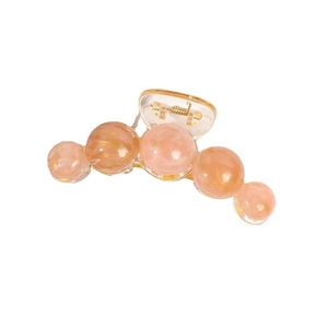 Grande pince à cheveux orange avec perles marbrées et mécanisme à ressort doré