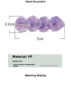 Détails de la pince à cheveux violette en forme de coquille, dimensions 7cm x 2.2cm et 8.5g