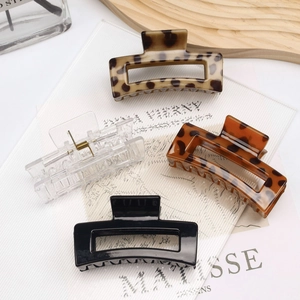 Set of 4 large square hair claws in leopard print, black, and clear plastic for thick hair