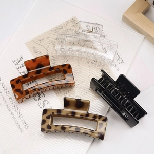 Set of four minimalist rectangular hollow hair claws in tortoise and solid colors