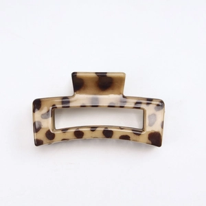 Detailed top view of a classic tortoise shell pattern square hair claw clip for women