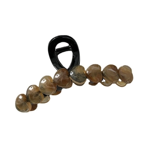 Amber heart shaped hair claw clip with brown marble pattern for women daily styling