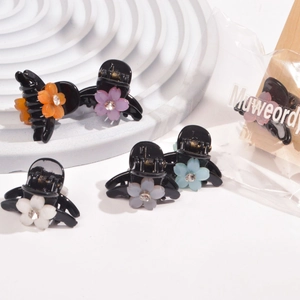 Mini floral hair claw clips with colorful rhinestone flowers and black plastic base