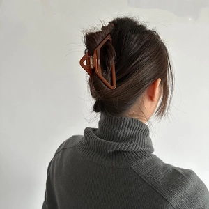 Brown tortoise shell large geometric hollow hair claw clip for elegant updo styles