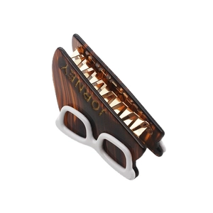 Fashionable tortoise shell acetate hair claw with white glasses frame design and gold comb