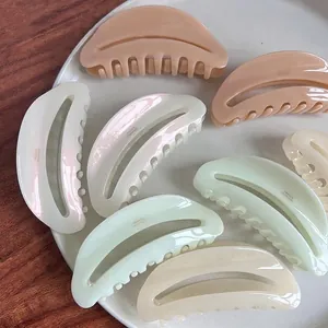 Retro France acetate hair claw clips in assorted Morandi colors on white tray