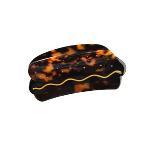 Acetate tortoiseshell claw clip with gold wave line for vintage hairstyle