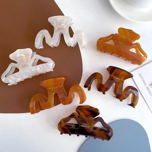 Set of 6 vintage acetate hair claws in amber and tortoiseshell for elegant updos