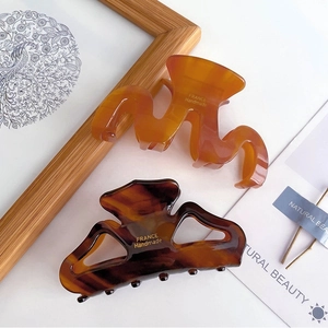 French style amber and tortoiseshell acetate hair claws with gold handmade lettering